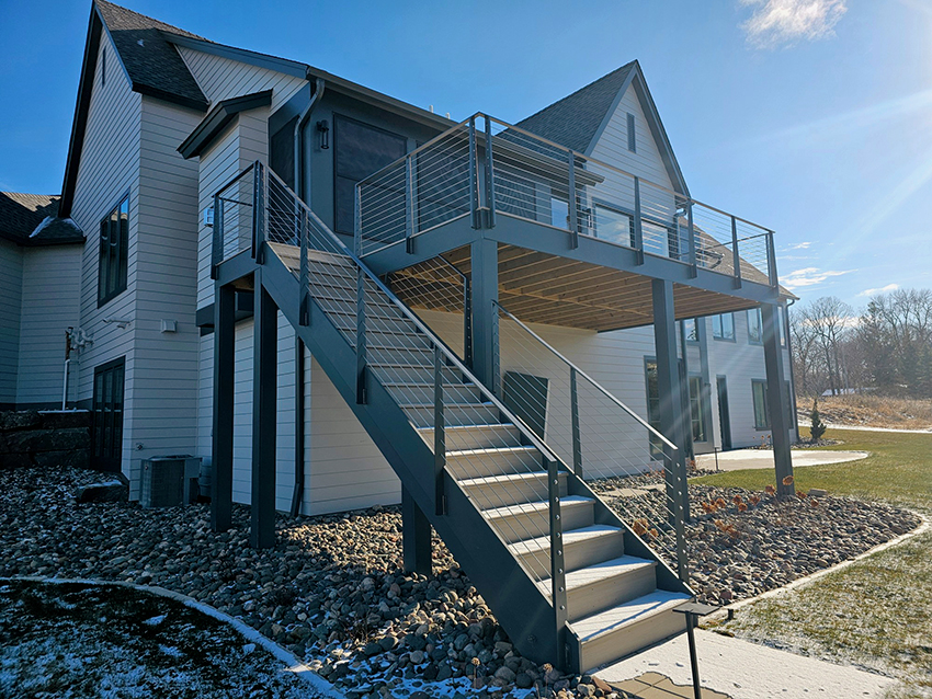 TimberTech AZEK PVC with Iron Cable Railing & Miratec Columns - Custom deck built by Dream Decks in Twin Cities, Minnesota