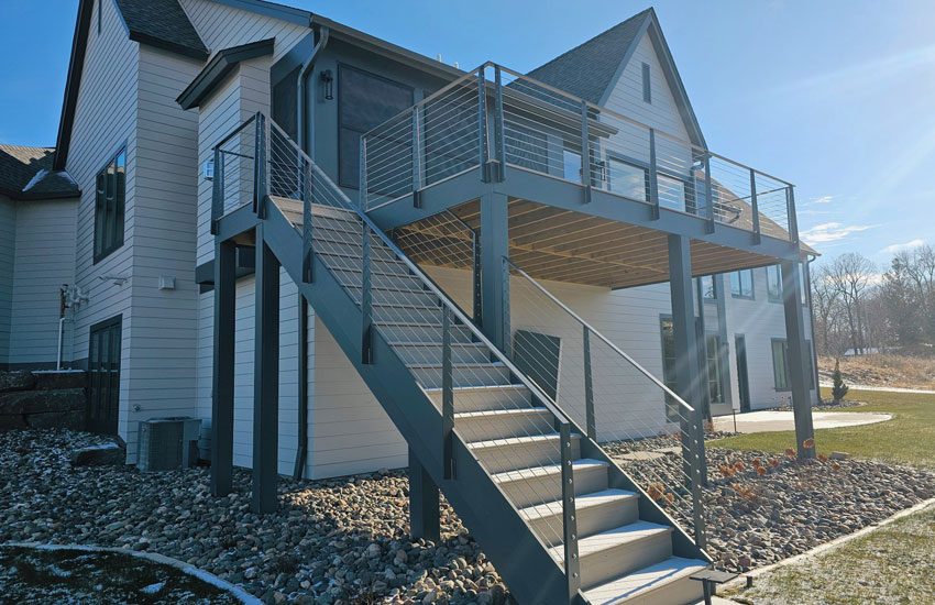 Two-level deck with integrated stairs
